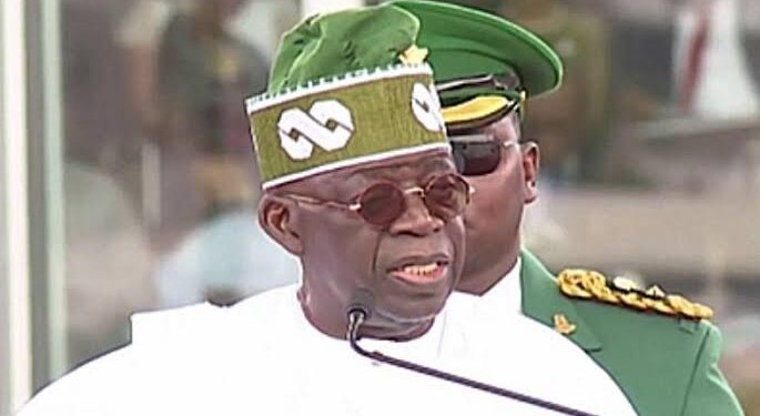 Nigeria’s president offers low-income workers a temporary minimum wage increase