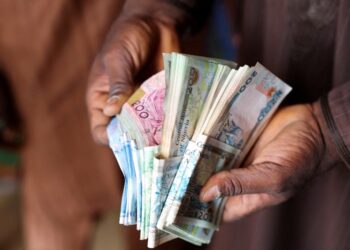 Nigerian naira hits record black market low of 1,100 per dollar