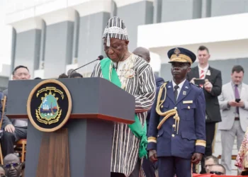 Liberia’s new president assisted from podium during inauguration