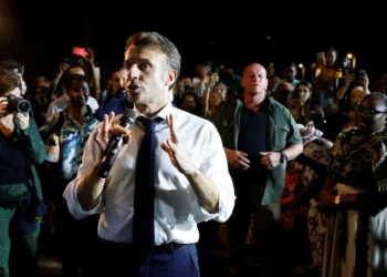 France’s Macron swears in angry exchange with residents of cyclone-hit Mayotte